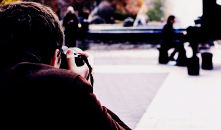 Wisconsin legal investigator and private detective Private detective taking a photo